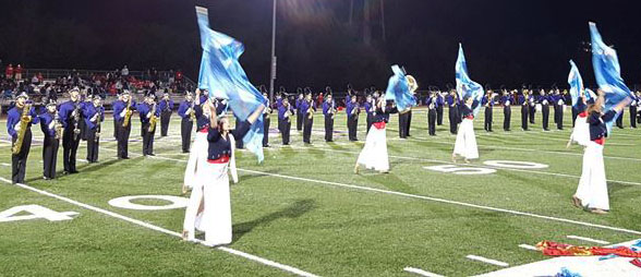 Mustangs march to "Revolution and Triumph"