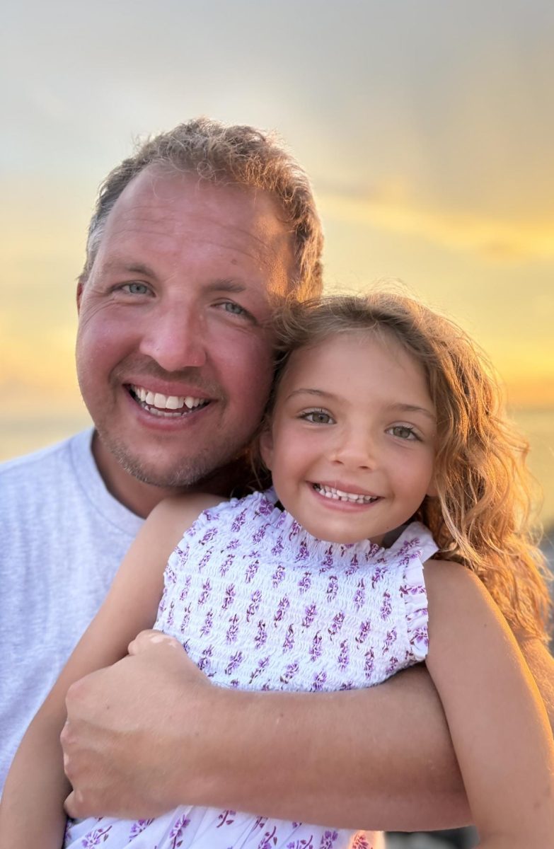 History Teacher Caleb Ankrom and his daughter